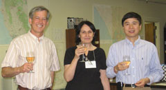 Director Brian Conrey celebrates with 100th Workshop Organizers
Maria-Carme Calderer and Jie Shen.